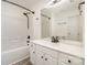 Clean bathroom with white vanity and a large mirror at 5463 Werburgh St, Charlotte, NC 28209