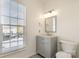 Clean bathroom with vanity and large window at 5463 Werburgh St, Charlotte, NC 28209