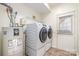 Laundry room with washer, dryer, and exterior access at 5463 Werburgh St, Charlotte, NC 28209