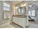 Double vanity bathroom with granite countertops and a large mirror at 823 Digby Rd, Rock Hill, SC 29730