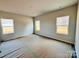 Bright bedroom with neutral walls and ample natural light at 1058 Bull Dog Ln, Wingate, NC 28174