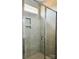 Modern shower with gray tile and glass enclosure at 1066 Bull Dog Ln, Wingate, NC 28174