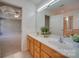Bathroom with double vanity, mirror, and access to bedroom and shower at 11628 Eastwind Dr, Charlotte, NC 28273
