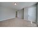 Bright bedroom with neutral walls and carpet flooring at 11628 Eastwind Dr, Charlotte, NC 28273