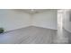 Bright bonus room features light gray vinyl plank flooring at 11628 Eastwind Dr, Charlotte, NC 28273