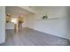 Spacious dining area with hardwood floors and modern chandelier at 11628 Eastwind Dr, Charlotte, NC 28273