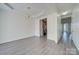 Open concept dining room with views into the kitchen and hallway at 11628 Eastwind Dr, Charlotte, NC 28273