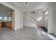 Open concept entryway looking into dining area, kitchen and stairs at 11628 Eastwind Dr, Charlotte, NC 28273