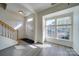 Bright and airy entryway with stairs and a view of a bay window at 11628 Eastwind Dr, Charlotte, NC 28273
