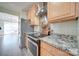 Modern kitchen with stainless steel appliances and granite countertops at 11628 Eastwind Dr, Charlotte, NC 28273