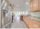 Modern kitchen with stainless steel appliances and granite countertops at 11628 Eastwind Dr, Charlotte, NC 28273