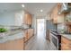 Modern kitchen with stainless steel appliances and granite countertops at 11628 Eastwind Dr, Charlotte, NC 28273