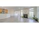 Living room features hardwood floors, fireplace and large windows at 11628 Eastwind Dr, Charlotte, NC 28273
