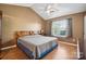 Main bedroom with king-size bed and ceiling fan at 12000 Presnell Pl, Charlotte, NC 28273