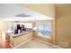 Kitchen features an island and white cabinets at 2652 Brackley Nw Pl, Concord, NC 28027