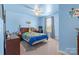 Light blue bedroom with ceiling fan and ample closet space at 109 Vintage Woods Ln, Shelby, NC 28150