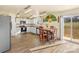 Open concept kitchen, stainless steel appliances, and access to backyard at 109 Vintage Woods Ln, Shelby, NC 28150