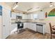 Modern kitchen featuring granite countertops and white cabinetry at 109 Vintage Woods Ln, Shelby, NC 28150