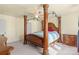 Main bedroom with four-poster bed, ceiling fan, and ample space at 109 Vintage Woods Ln, Shelby, NC 28150