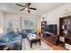 Comfortable living room featuring hardwood floors and neutral decor at 11535 Elizabeth Madison Ct, Charlotte, NC 28277