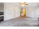 Bedroom with double closets, ceiling fan, and workspace at 1202 Brook Dr, Lancaster, SC 29720