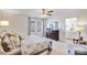 Main bedroom features a king-size bed and ample natural light at 12217 Lady Bell Dr, Charlotte, NC 28278