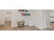 Play area with toy shelf and comfy chair at 14529 Winged Teal Rd, Charlotte, NC 28278