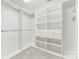 Spacious walk-in closet with ample shelving and hanging space at 15405 Canmore St, Charlotte, NC 28277