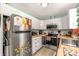 Bright kitchen with white cabinets, stainless steel appliances, and butcher block countertops at 1776 Molly Cir, York, SC 29745