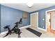 Simple bedroom with Peloton bike and plenty of space at 208 Grey Rd, Davidson, NC 28036