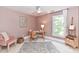 Cozy bedroom with a desk, chair, and area rug at 208 Grey Rd, Davidson, NC 28036