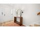 Clean and modern entryway with a console table and mirror at 3631 Maple Glenn Ln, Charlotte, NC 28226