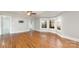 Hardwood floors and bay window in spacious living room at 407 King St, Monroe, NC 28110