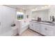 Elegant bathroom with double vanity, soaking tub, and shower at 4202 Steel Way, Sherrills Ford, NC 28673