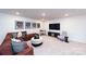 Finished basement with comfortable seating and a large TV at 4225 Steel Way, Sherrills Ford, NC 28673