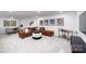 Spacious basement recreation area, featuring a sectional sofa and game table at 4225 Steel Way, Sherrills Ford, NC 28673