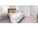 Bedroom with a gray bed frame and neutral-toned bedding at 4225 Steel Way, Sherrills Ford, NC 28673