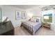 Bright bedroom with a metal bed frame and neutral color scheme at 4225 Steel Way, Sherrills Ford, NC 28673