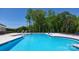 Relaxing community pool with plenty of lounge chairs at 4225 Steel Way, Sherrills Ford, NC 28673