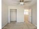 Bedroom with double door closet and access to hallway at 4337 Glenlea Commons Dr, Charlotte, NC 28216