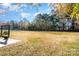 Spacious backyard with open field and tree line at 473 Griggs Rd, Clover, SC 29710