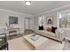 Living room with gray walls and a light beige couch at 3062 Beech Ct, Indian Trail, NC 28079