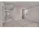 Spacious upper hallway with carpet and access to bedrooms at 5156 Tommy Ln # 1301, Stanley, NC 28164