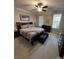 King-size bedroom with two windows and en-suite bathroom at 6254 Hove Rd, Mint Hill, NC 28227