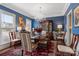 Formal dining room featuring hardwood floors, chandelier, and blue walls at 919 38Th Ne Ave, Hickory, NC 28601