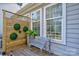 Inviting patio area with decorative wall and seating at 10029 Daufuskie Dr, Charlotte, NC 28278