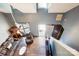 High-angle view of a living room with hardwood floors, a sofa, and a view of the entryway at 109 Golden Rain Ct, Mount Holly, NC 28120