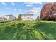 Large backyard with view of home's back elevation at 1406 Lonan Dr, Waxhaw, NC 28173