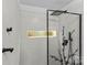 Contemporary shower with geometric tile and floral-etched glass at 1406 Lonan Dr, Waxhaw, NC 28173