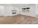 Finished basement with fireplace and hardwood floors at 148 Windy Dell Dr, Tega Cay, SC 29708
